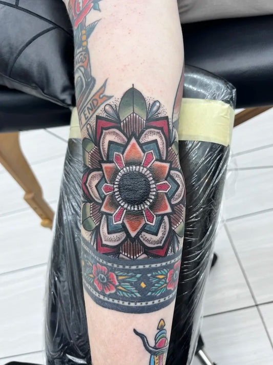 Small Neo Traditional Mandala Flower Tattoo on Men Elbow