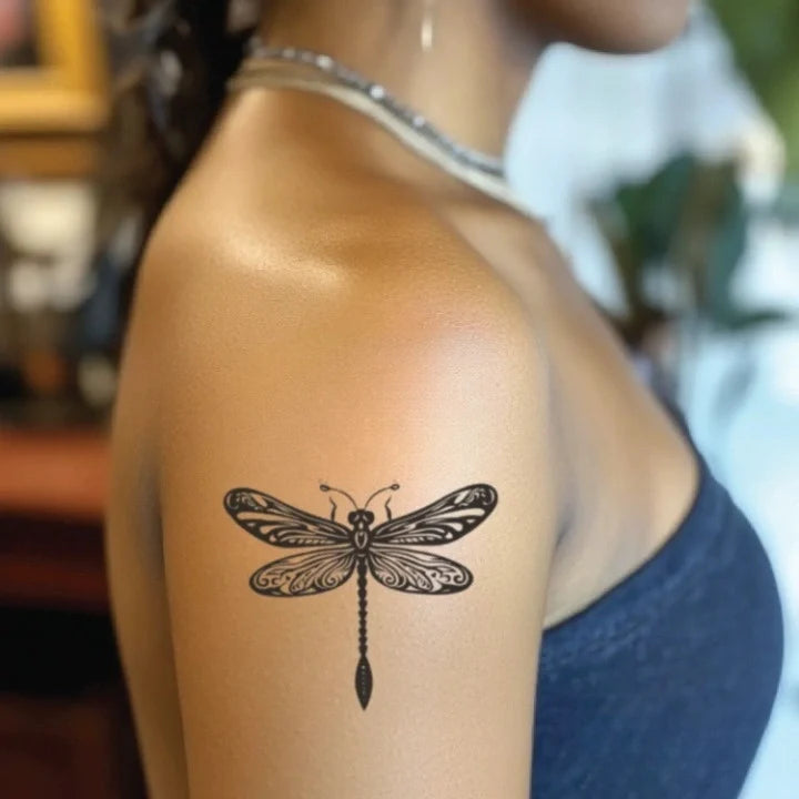 tribal dragonfly bicep temporary tattoo idea design