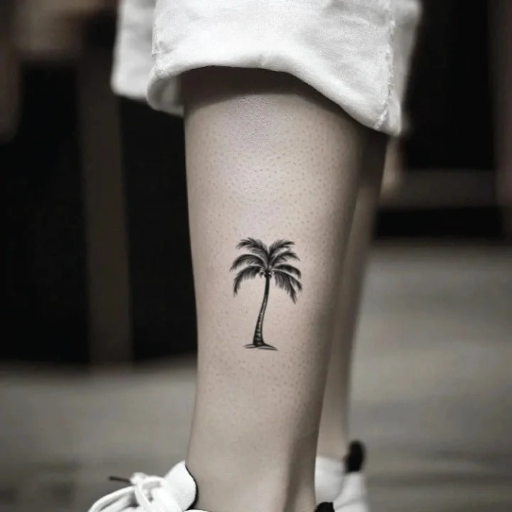 Minimalist Palm Tree Tattoo: Simple Elegance with Timeless Symbolism