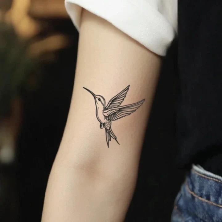 hummingbird outline bicep temporary tattoo idea design