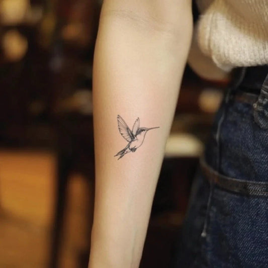 small hummingbird forearm temporary tattoo idea design