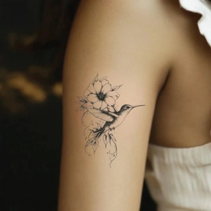 hummingbird and flower bicep temporary tattoo idea design