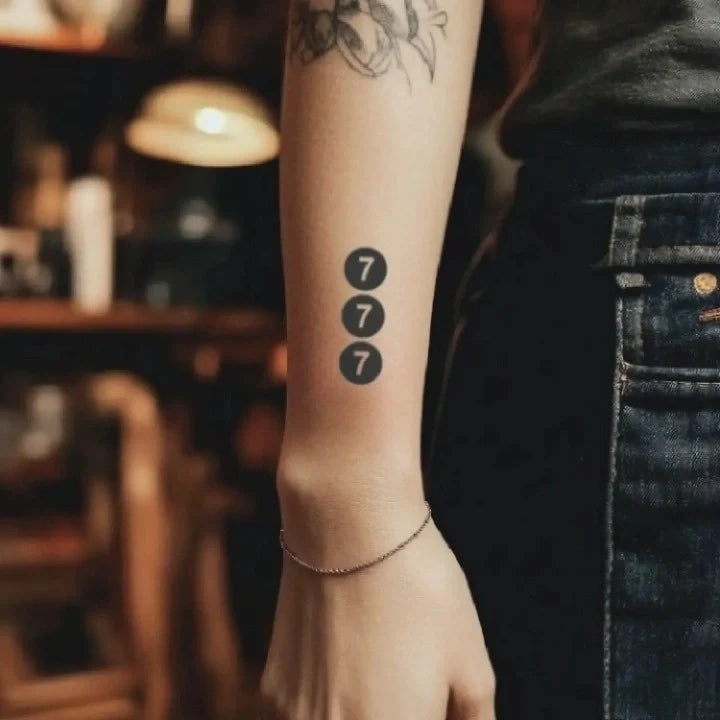 vertical triple 777 forearm temporary tattoo idea design