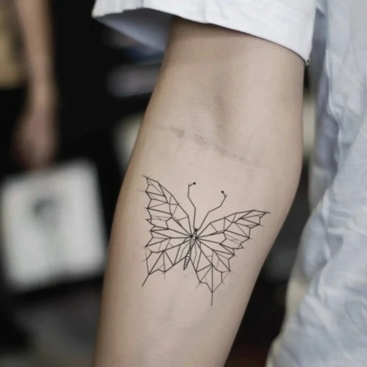 geometric butterfly forearm temporary tattoo idea design