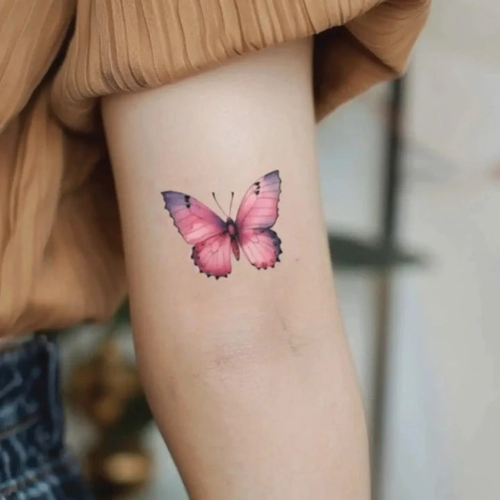 pink butterfly bicep temporary tattoo idea design