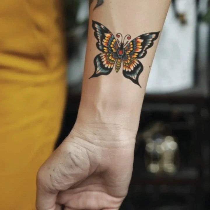 neo traditional butterfly wrist temporary tattoo idea design