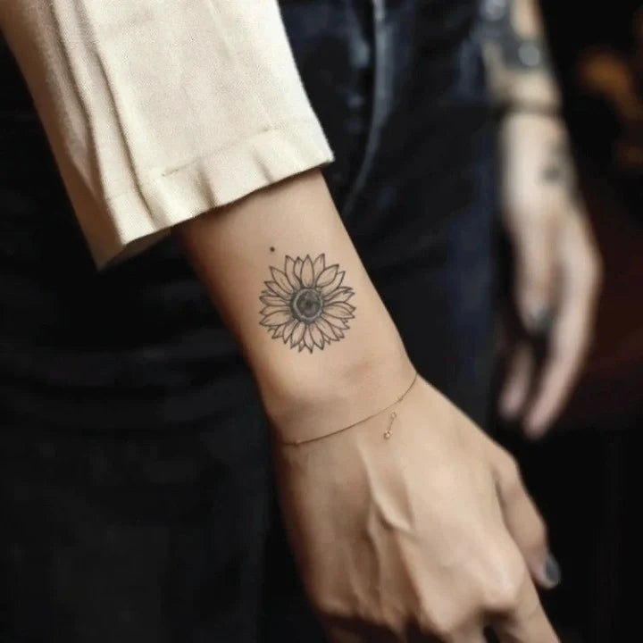 minimal fine line sunflower wrist temporary tattoo idea design