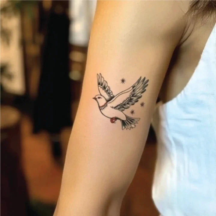 simple traditional dove outline bicep temporary tattoo idea design