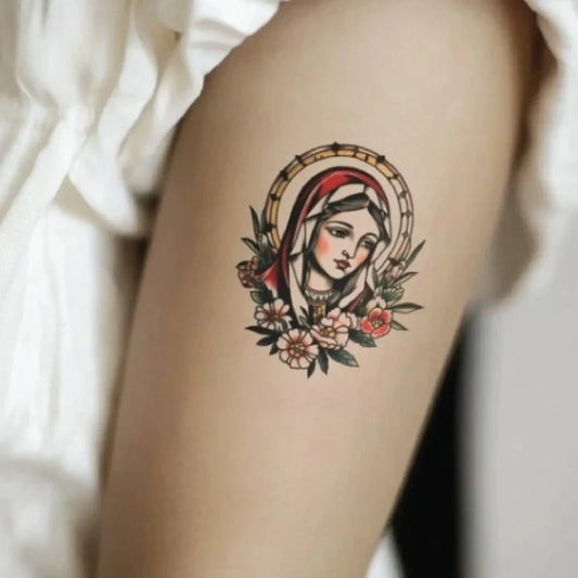 simple traditional virgin mary bicep temporary tattoo idea design