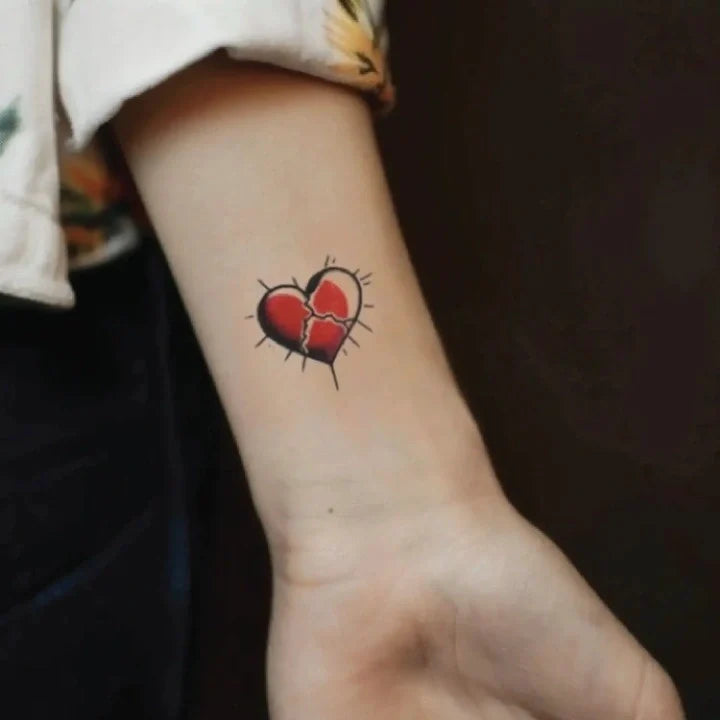 simple red broken heart outline wrist temporary tattoo idea design