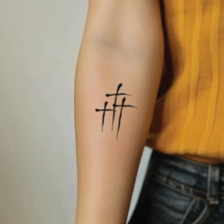 minimalist 3 cross forearm temporary tattoo idea design