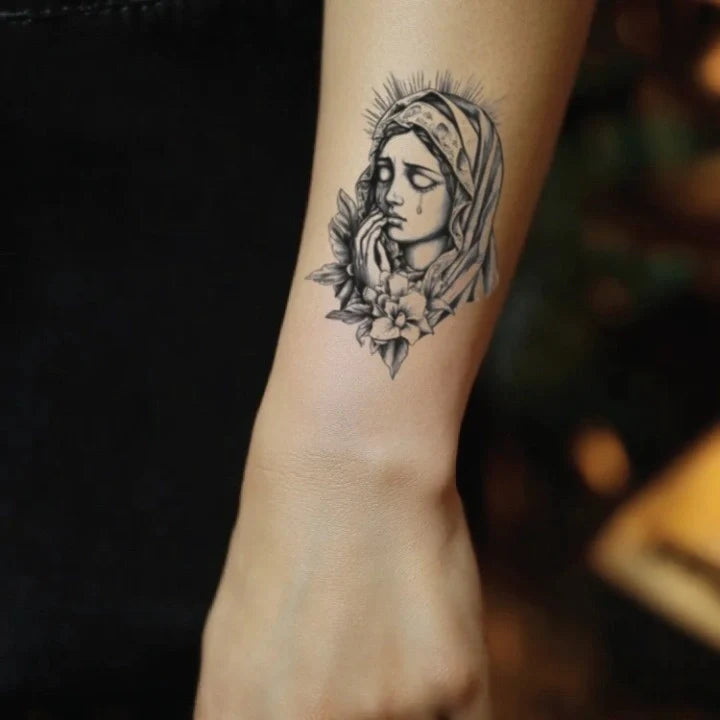 virgin mary crying forearm temporary tattoo idea design