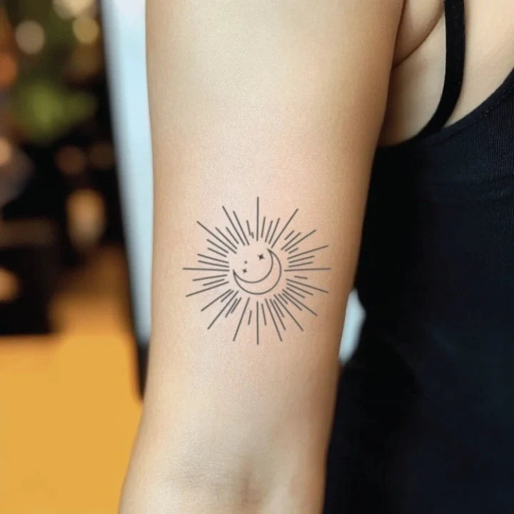 feminine fine line sun moon and stars bicep temporary tattoo idea design
