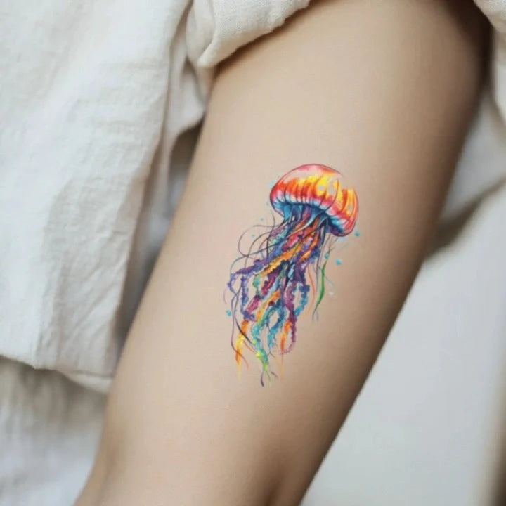 colorful jellyfish bicep temporary tattoo idea design