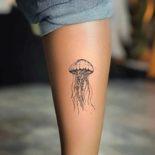 realistic jellyfish leg temporary tattoo idea design
