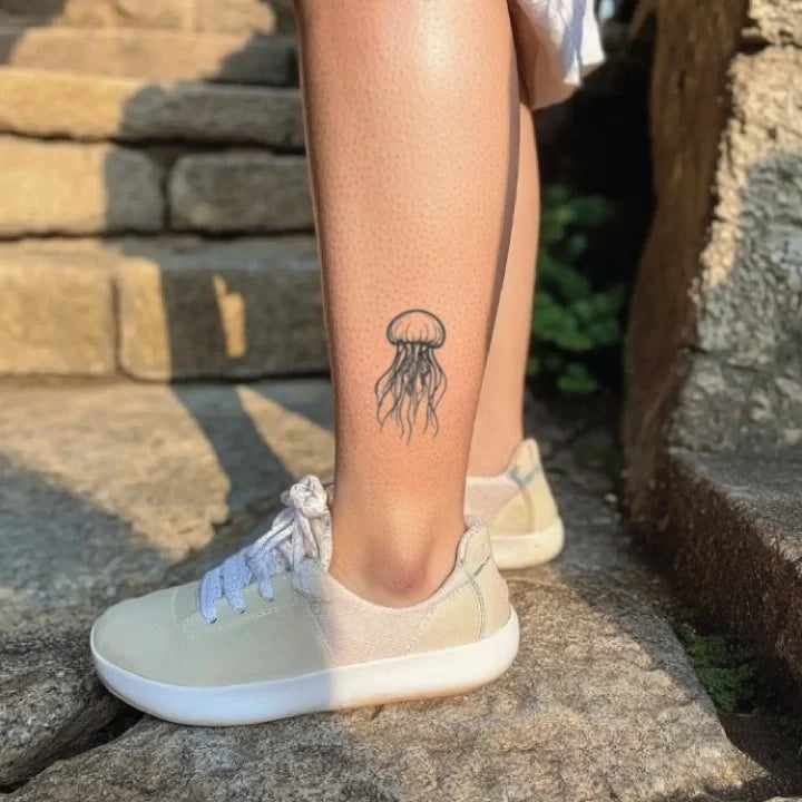 simple jellyfish ankle temporary tattoo idea design