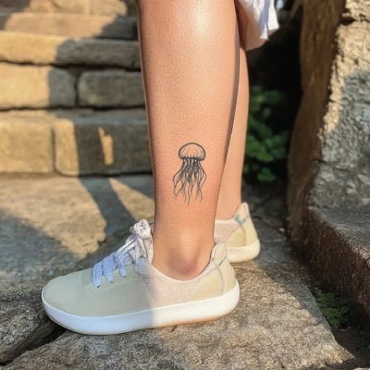 simple jellyfish ankle temporary tattoo idea design