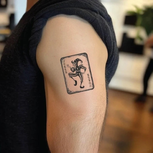 joker playing card bicep temporary tattoo idea design