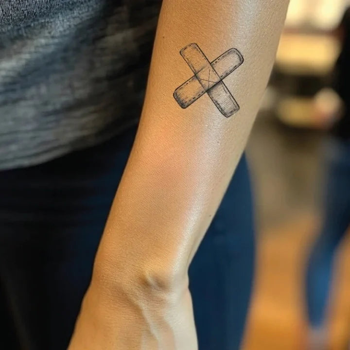 cross bandage forearm temporary tattoo idea design