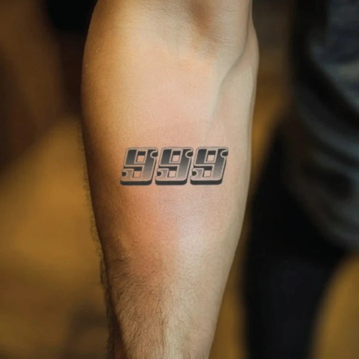 999 old school font forearm temporary tattoo idea design