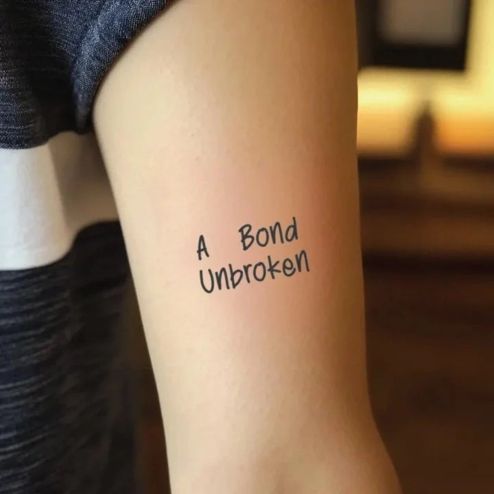 a bond unbroken bicep temporary tattoo idea design