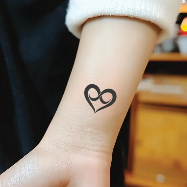simple infinity heart symbol wrist temporary tattoo idea design