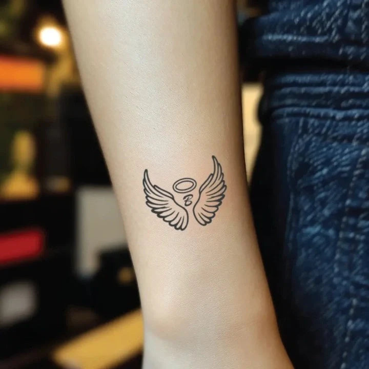 angel wings with letter b wrist temporary tattoo idea design