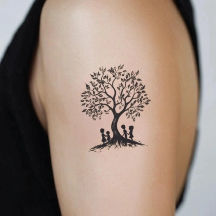 family under the tree bicep temporary tattoo idea design