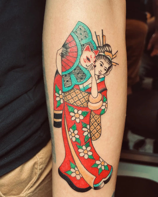 japanese tattoo of a woman in a red kimono on forearm