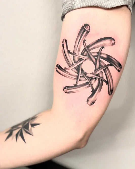 black and grey dotwork 3d interwoven lines tattoo on bicep