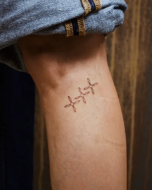 3 small geometric patterns minimalist fine line tattoo