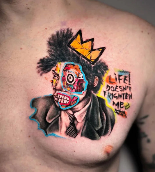 colorful abstract man with crown and texts in suit tattoo on man chest