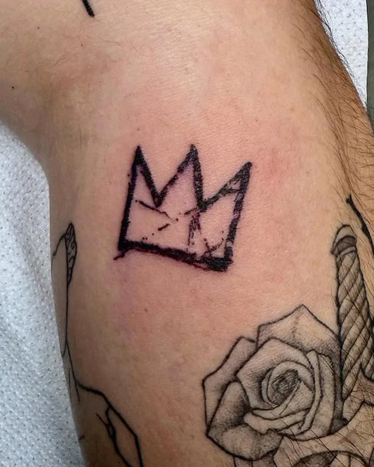 simple sketch crown outline tattoo