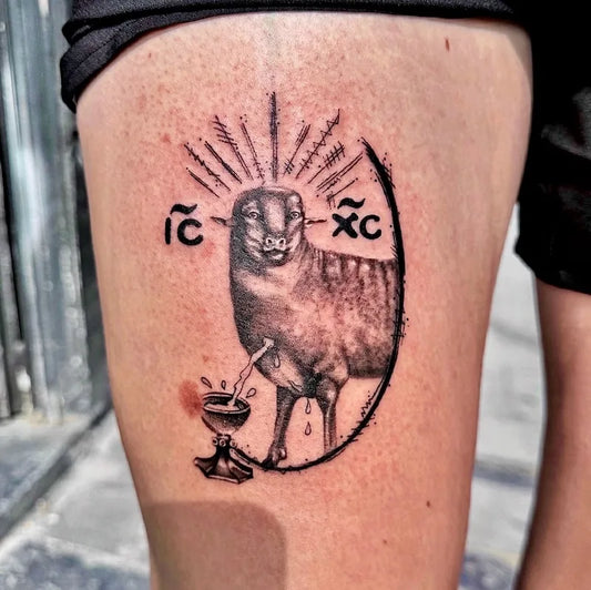 black and grey abstract goat tattoo on thigh