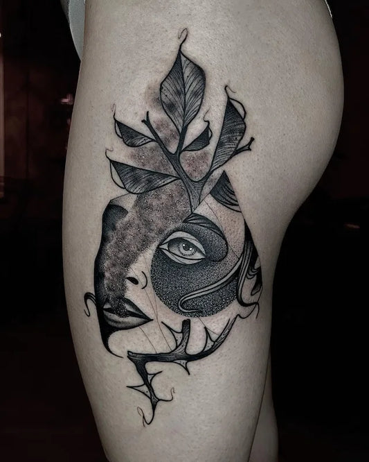 abstract blackwork dotwork tattoo on woman hip thigh