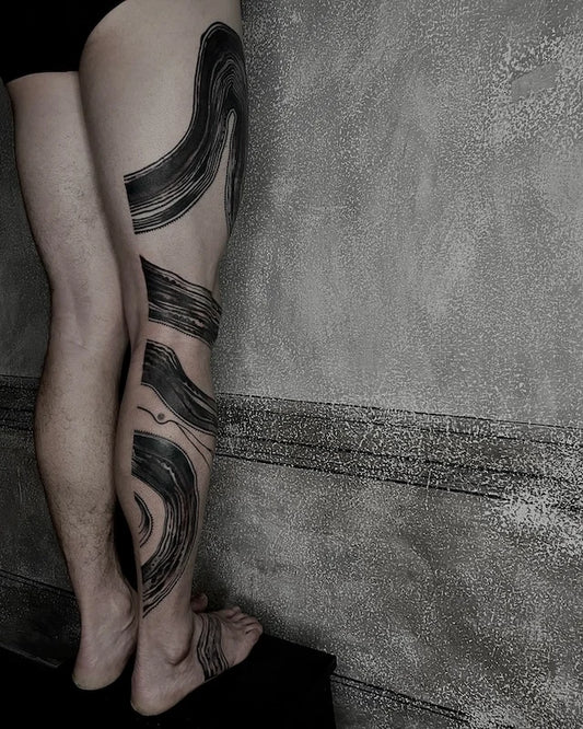 abstract blackwork lines tattoo on man leg full leg sleeve