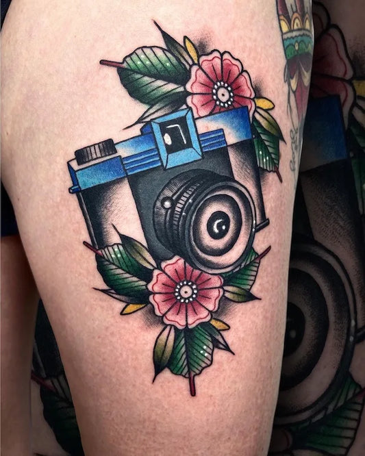 colorful traditional camera with flowers tattoo