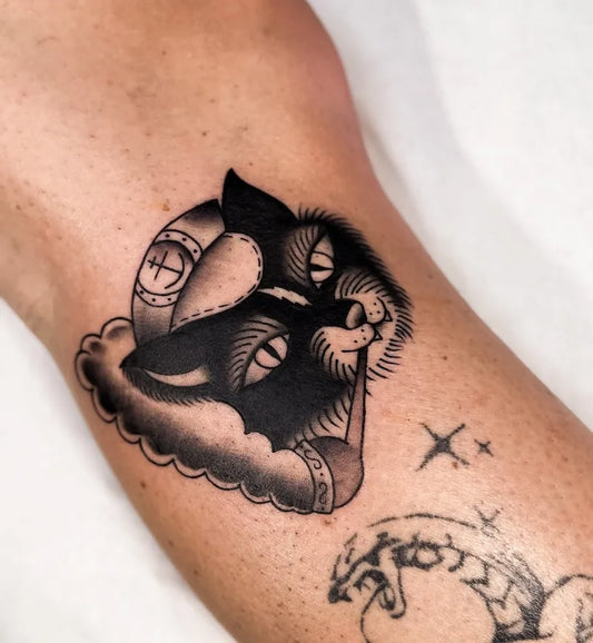 traditional sailor cat with pipe tattoo