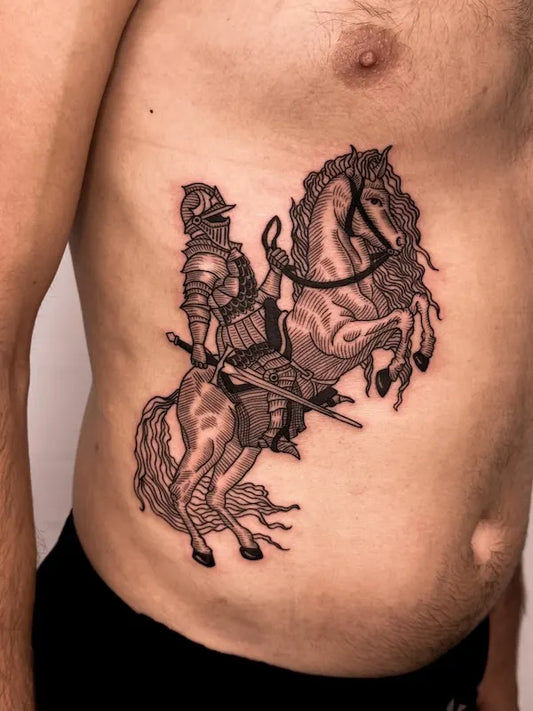 Tattoo of a warrior on a horse on man stomach