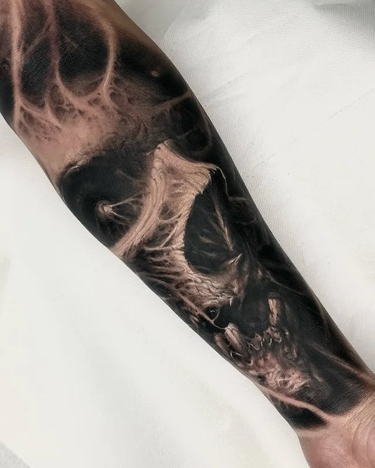skull black and grey darkwork realism tattoo on arm