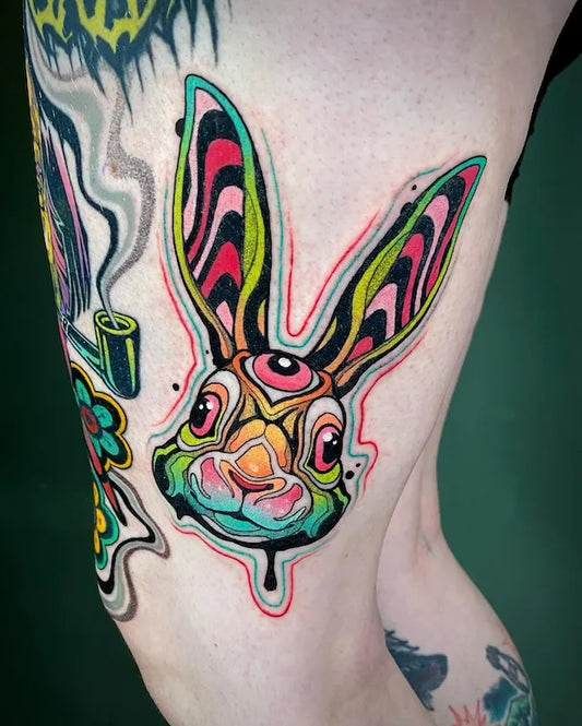 colorful new school neo-traditional rabbit bunny tattoo on thigh