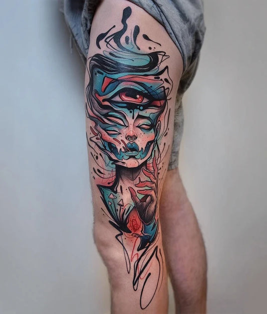 colorful new school neo-traditional abstract woman face tattoo on thigh leg