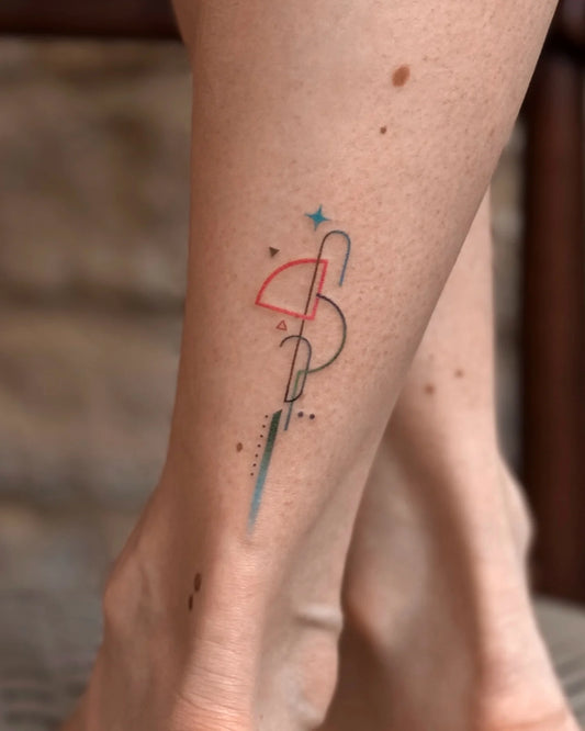 Bang Bang Basil color geometric abstract tattoo on ankle