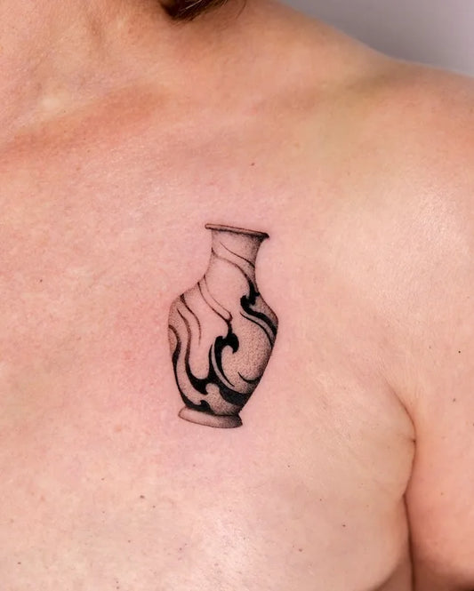 dotwork flower vase tattoo on chest
