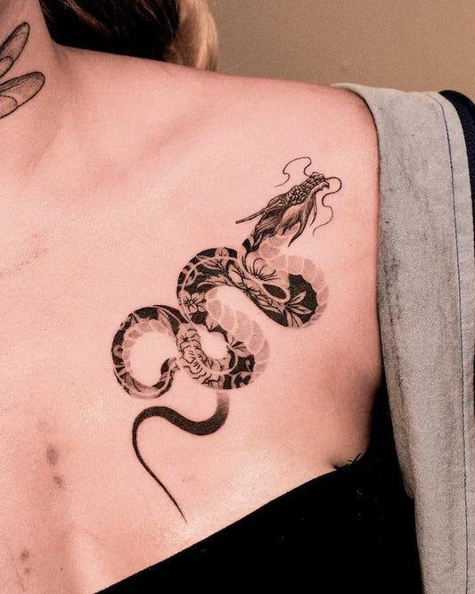 floral dragon black and grey tattoo on woman shoulder