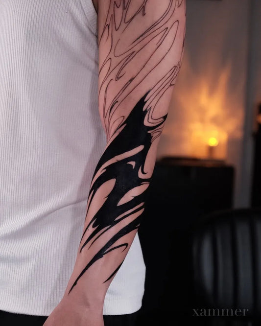Big Abstract Black Flame Tattoo on Men Arm by @xammer.ink