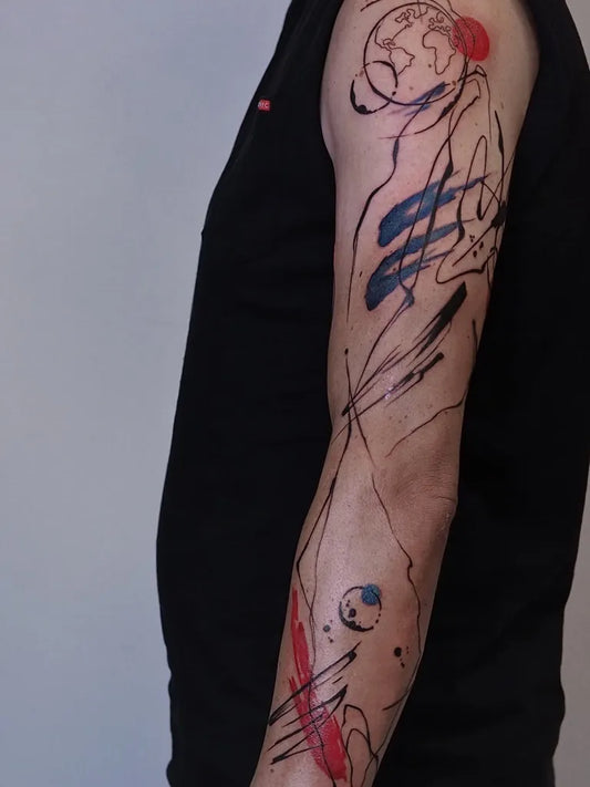 Big Abstract Globe and Splatter Tattoo on Men Arm by @moni_lien_pham