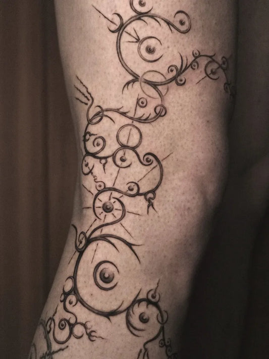 Big Abstract Thorn Vine Eye Tattoo on Men Leg by @hanakakihana