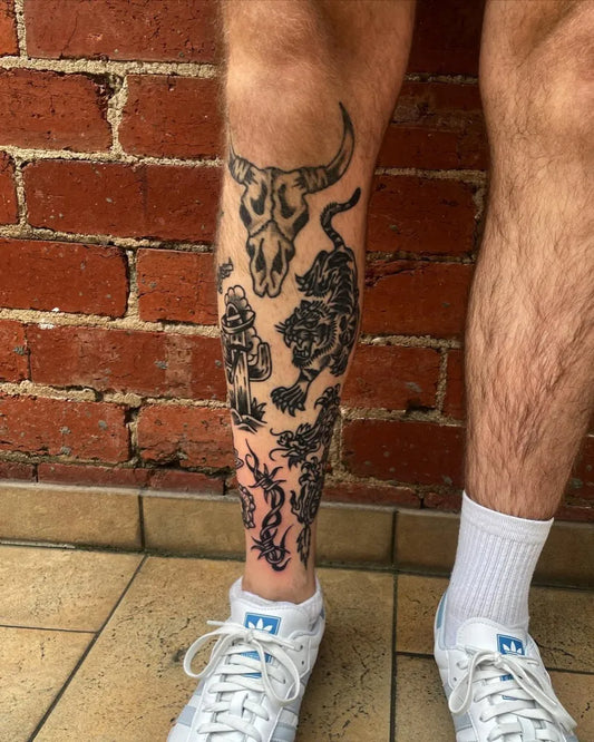 Big American Traditional Bull Skull and Tiger on Men Leg Tattoo by @aaroncaldow