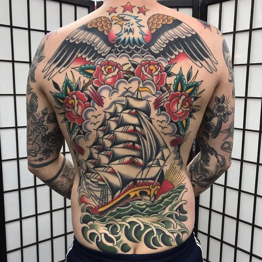 Big American Traditional Eagle Ship Roses Nautical Tattoo on Men Back by @oldschoolbacktattoos